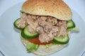 Close up of tuna fish sandwich with lettuce, tomato, cucumber Royalty Free Stock Photo