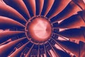 Close up of a turbofan turbine blades jet engine in modern airplane with pink and blue gradient toned Royalty Free Stock Photo