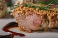 Close-up of turkey fillet with herbs and spices. Dish of author`s cuisine. Turkey meat recipe from a restaurant. Selective focus