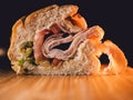 close up of turkey sandwich on bamboo cutting board Royalty Free Stock Photo