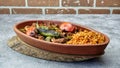 Turkish chicken Kebab called Mudurnu Kebab, garnished with vegetables, bulgur pilaf served on ceramic dish - Turkish,  Food Kebab Royalty Free Stock Photo