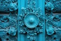 a close-up of a turquoise door with intricate carvings Royalty Free Stock Photo