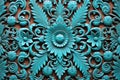 a close-up of a turquoise door with intricate carvings Royalty Free Stock Photo