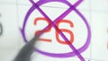 Close-up of the twenty-sixth day on the calendar signed by a purple pen Royalty Free Stock Photo