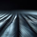Close-up of twisted metal cables aligned in parallel rows, creating a dynamic pattern. Royalty Free Stock Photo