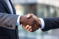 Close-up of two african american businessmen shaking hands outdoors Royalty Free Stock Photo