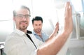 Close up.two architects working in a modern office Royalty Free Stock Photo