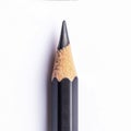 Close up of two black pencils on a white surface. Suitable for office or school themes Royalty Free Stock Photo