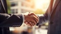 Close-up Capture of Businessmen Handshake Signifying Successful Agreement in a Bustling Corporate Environment. Generative Ai Royalty Free Stock Photo