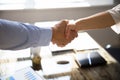 Close-up Of Two Business Partners Shaking Hands Royalty Free Stock Photo