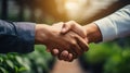 Close up of two businessmen shaking hands with each other in the park Generative AI Royalty Free Stock Photo