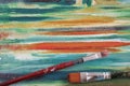 Close up of two dirty artistic brushes on oil painting on canvas, art jute, texture pattern for vivid background Royalty Free Stock Photo