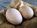 Close up of Two eggs are placed on the table. Royalty Free Stock Photo