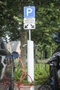 Close-up of two electrisch vehicles charging at a Dutch public charging station