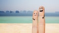 Close up of two fingers with smiley faces Royalty Free Stock Photo