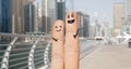 Close up of two fingers with smiley faces Royalty Free Stock Photo