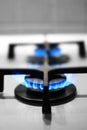 Close up of two gas stove flame, domestic gas consumption concept