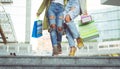 Close up on two girls with shopping bags Royalty Free Stock Photo