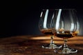 Close up of two glass goblets with alcohol