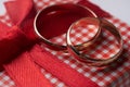 Close-up of two gold Wedding rings and Gift box Royalty Free Stock Photo
