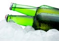 Close-up Two green bottles of beer cool in ice Royalty Free Stock Photo