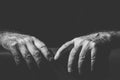 Two hands grabbing something in black and white Royalty Free Stock Photo