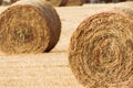Close up of two hay rolls in field Royalty Free Stock Photo