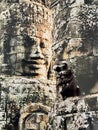 Close up of two Khmer Bayon faces, Angkor Wat, Siem Reap, Cambodia Royalty Free Stock Photo