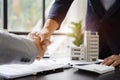 Close up two men shake hands at business meeting, office negotiations. Making deal sign, conclude contract, reach agreement, Royalty Free Stock Photo