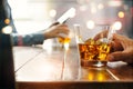 Close-up two men drinking whiskey alcoholic beverage