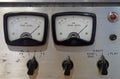 Close up of two old decibel meters on an old vintage reel to reel tape recorder with control knobs and switches Royalty Free Stock Photo