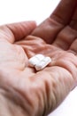Pain killers in a hand Royalty Free Stock Photo
