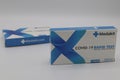 Close up of two packets of covid rapid test kits with copy space