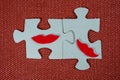 Close-up of two parts of puzzle. Symbolic women with lips. The concept of psychological compatibility, friendship. Royalty Free Stock Photo