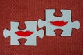 Close-up of two parts of puzzle. Symbolic women with lips. The concept of psychological compatibility, friendship. Royalty Free Stock Photo