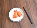 Close-up of two pieces of fried chicken legs served on a white plate Royalty Free Stock Photo