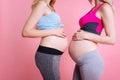 Close up of two pregnant bellies Royalty Free Stock Photo