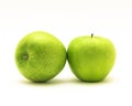 Close-up two raw fresh Granny Smith apples isolated on white Royalty Free Stock Photo