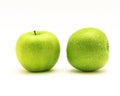 Close-up two raw fresh Granny Smith apples isolated on white Royalty Free Stock Photo