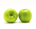 Close-up two raw fresh Granny Smith apples isolated on white Royalty Free Stock Photo