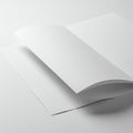 A close-up of two sheets of white paper on a flat surface. The top sheet is slightly Royalty Free Stock Photo