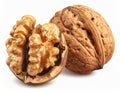 Close up of Two Walnuts One Cracked Open Showing Nut Against White Background Royalty Free Stock Photo
