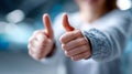 Close-up of two wet hands giving a strong double thumbs-up gesture Royalty Free Stock Photo