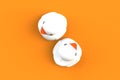 Close up of two white rubber ducks isolated. Bath toys on a orange background. Top view with copy space. Summer wallpaper. Royalty Free Stock Photo