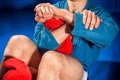 Man wrestler makes submission wrestling Royalty Free Stock Photo