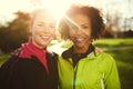 Close-up of two young sportswomen in park