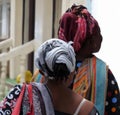 Close up of two Zanzibar women in traditional dress from behind