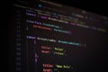 Close-up of TypeScript code with breadcrumb navigation logic on a dark screen, representing frontend web development, UI routing, Royalty Free Stock Photo