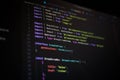 Close-up of TypeScript code on dark editor screen showing module imports, interface declarations, and frontend components, ideal Royalty Free Stock Photo