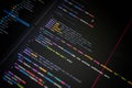 Close-up of TypeScript source code using async functions and API calls to fetch paginated data on a dark IDE. Great for Royalty Free Stock Photo